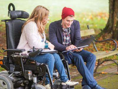 A man and woman having a conversation and review